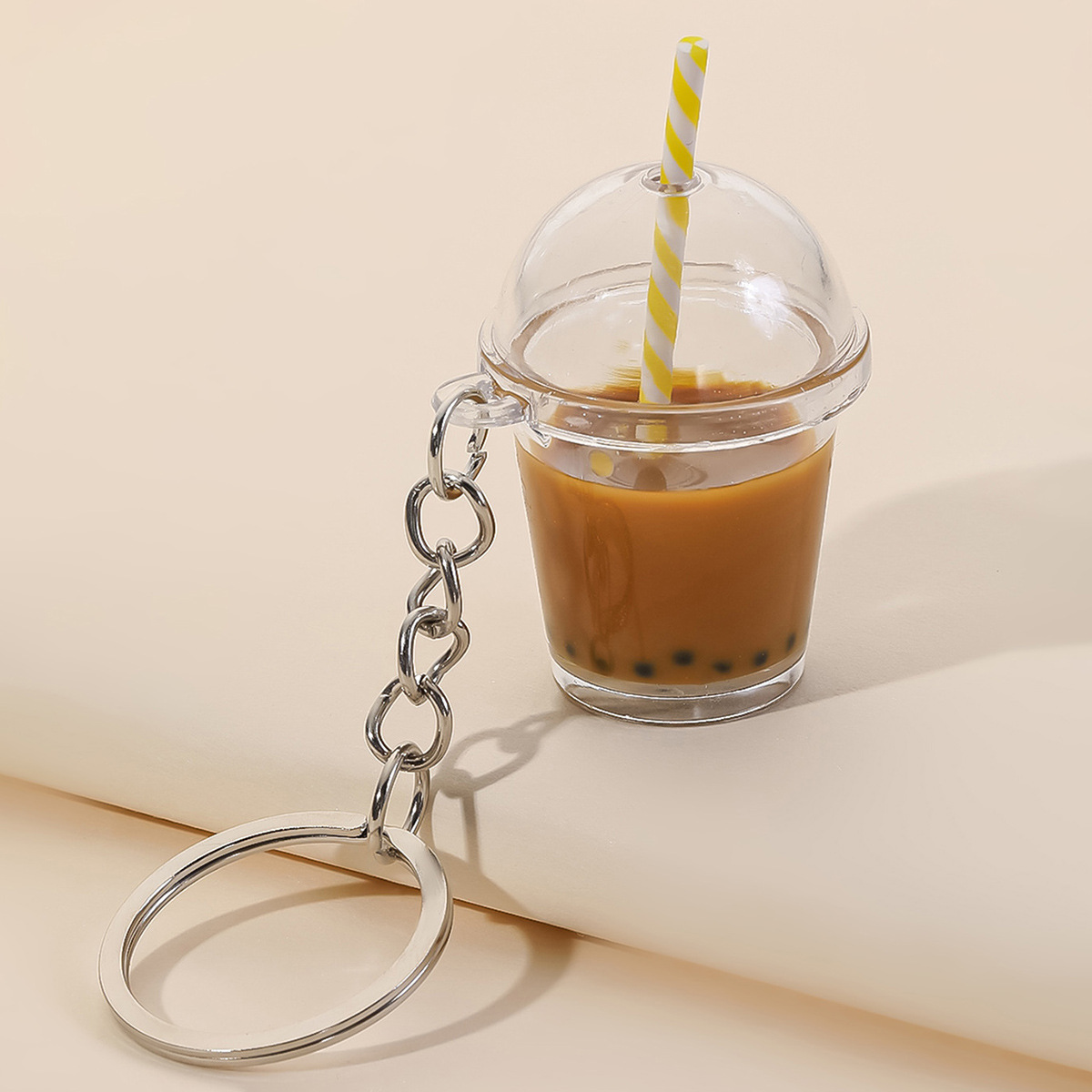 Melk Thee Sleutelhanger Vloeib - Coffee And Tea Lyrics recensie en prijs